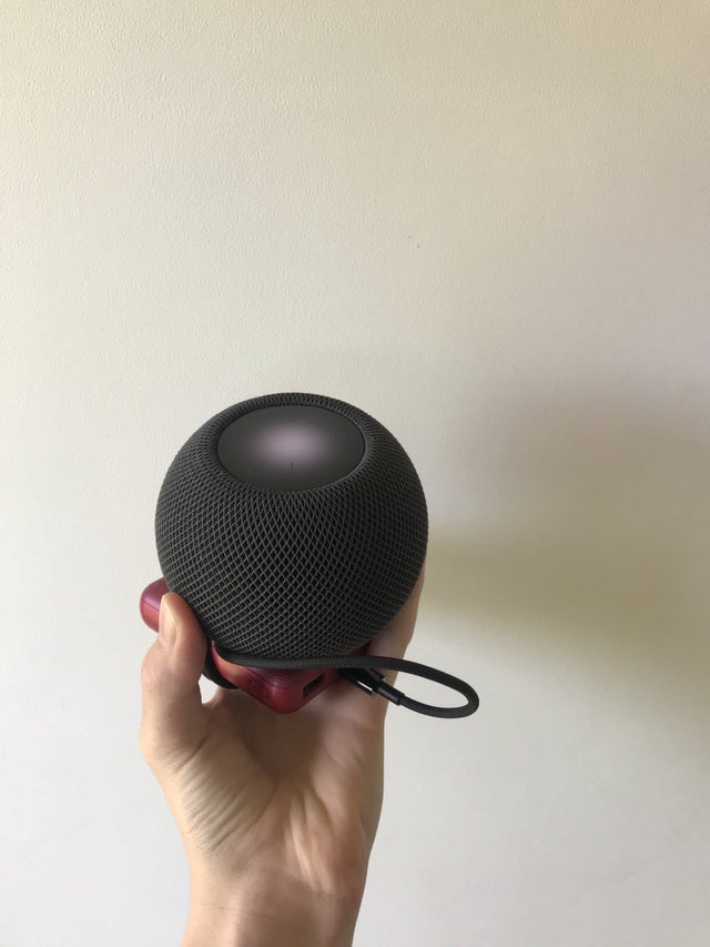 HomePod mini powering through a portable charger